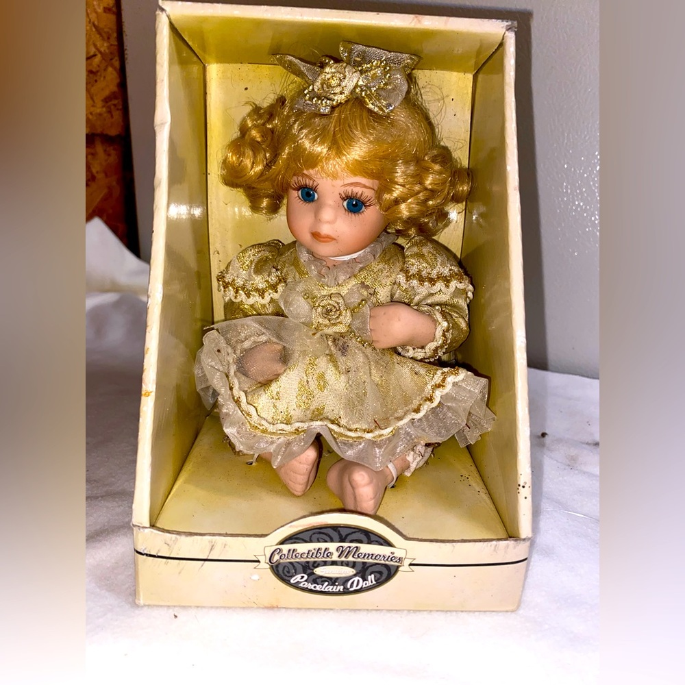 Blonde porcelain doll new in box